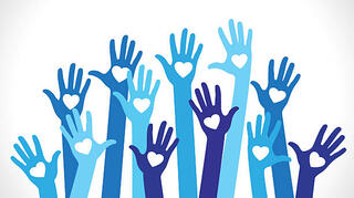 Hands raised to volunteer